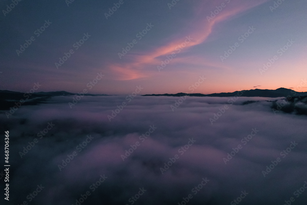 Flying above the clouds sunrise and fog Flying above the clouds sunrise and fog