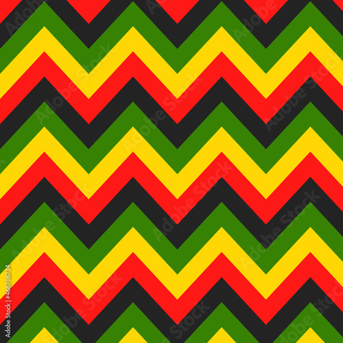 Jamaican color zigzag seamless pattern. Chevron Rastafarian on classic rasta reggae colors background. Vector illustration wallpaper.