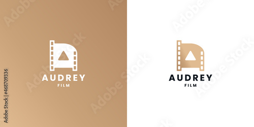 film video with letter a logo design with golden color