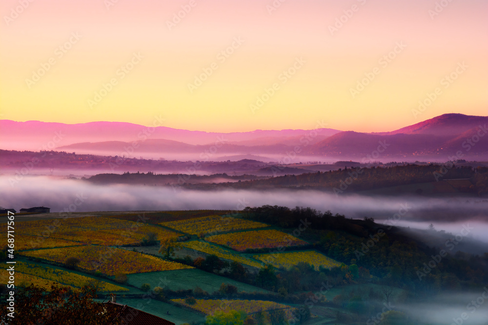 Mountains of Beaujolais with first morning lights, France