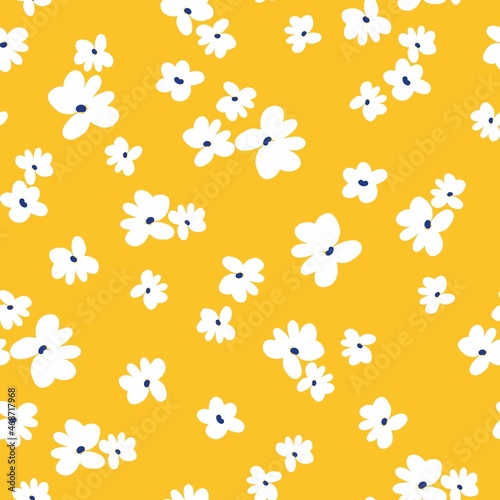 Seamless vintage pattern. cute cute white flowers on a yellow background. vector texture. fashionable print for textiles and wallpaper.