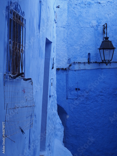 Arabic wall in african Chefchaouen city in Morocco - vertical © Jakub Korczyk