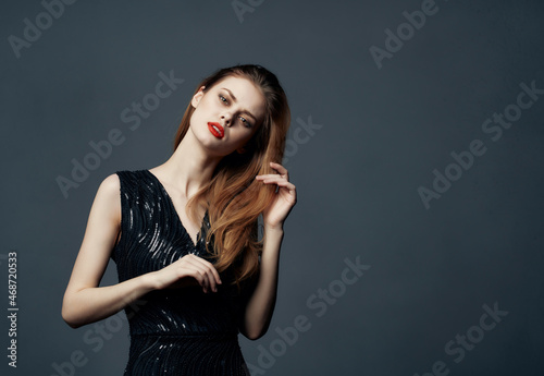 pretty woman in a black dress fashion Lifestyle isolated background