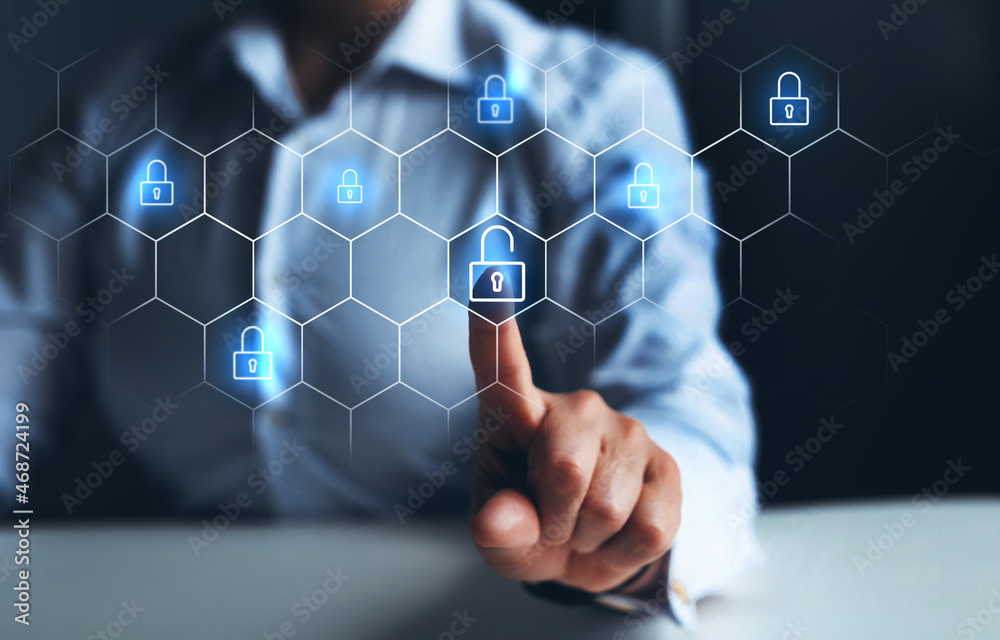 Businessman pointing digital screen with unlock icon symbol. Concept of Unlock business, security, hacking and attack. Businessman pointing digital screen with unlock icon symbol. Concept of Unlock business, security, hacking and attack.