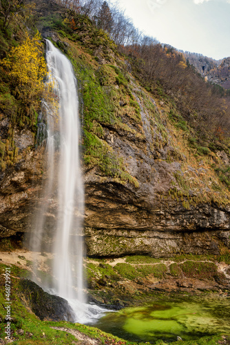 Beautiful autumn scene at Goriuda waterfall in the Julian Alps. Chiusaforte  Udine province  Friuli Venezia Giulia  Italy.