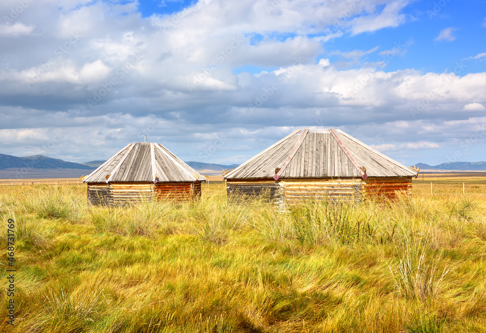 Wooden yurts in the steppes of Khakassia