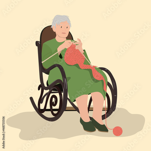 Senior old woman grandmother sitting and knitting scarf. Elderly knitting concept. Pastime, leisure, grandparents
