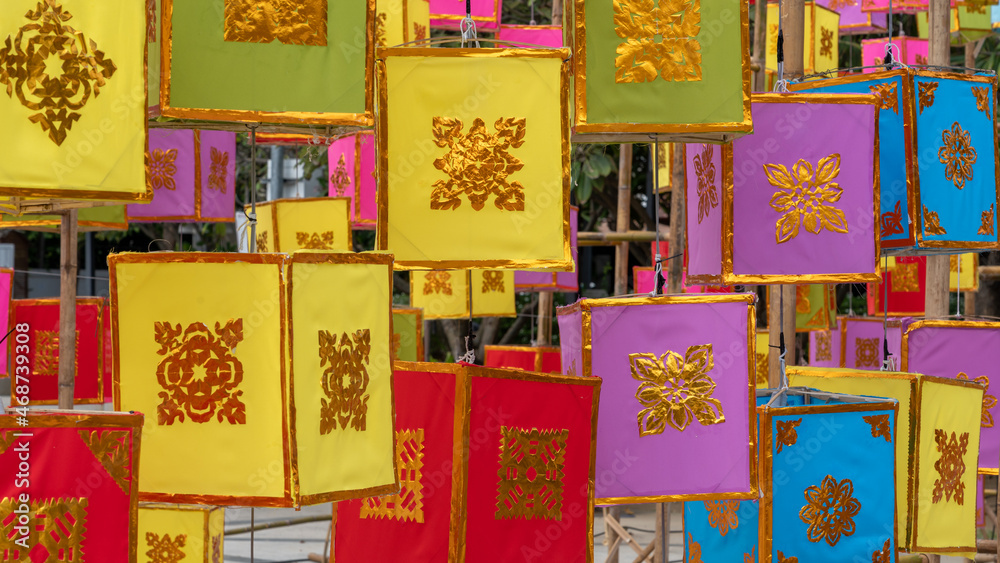 Colorful traditional paper lanterns for Loi Krathong aka Yi Peng famous annual festival decorating the city of Chiang Mai, Thailand