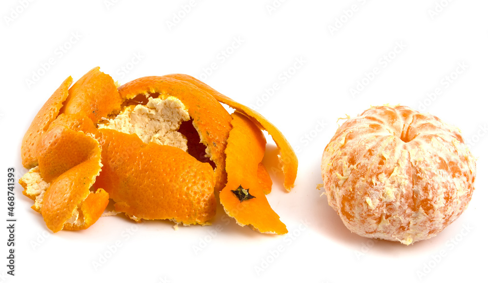 Peeled tangerine and peel isolated on white background.
