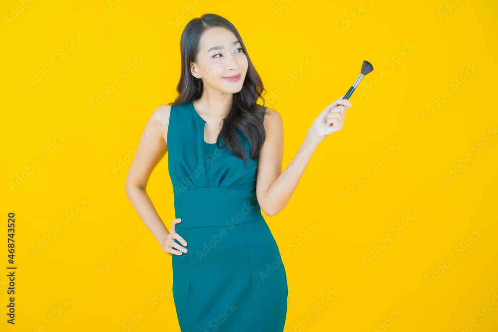 Portrait beautiful young asian woman with make up brush cosmetic Portrait beautiful young asian woman with make up brush cosmetic