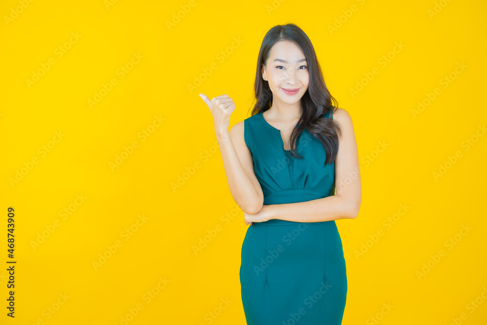 Portrait beautiful young asian woman smile with action Portrait beautiful young asian woman smile with action