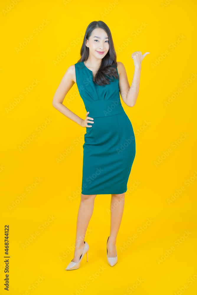 Portrait beautiful young asian woman smile with action Portrait beautiful young asian woman smile with action