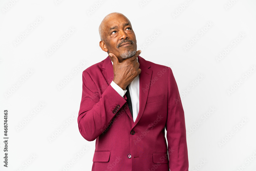 Cuban senior isolated on white background having doubts Cuban senior isolated on white background having doubts