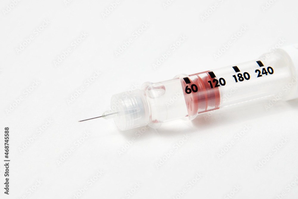 Insulin pen with insulin medicine on white background Insulin pen with insulin medicine on white background