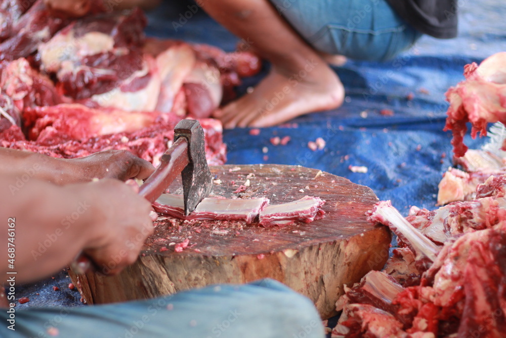 Eid al-Adha celebration by slaughtering goats