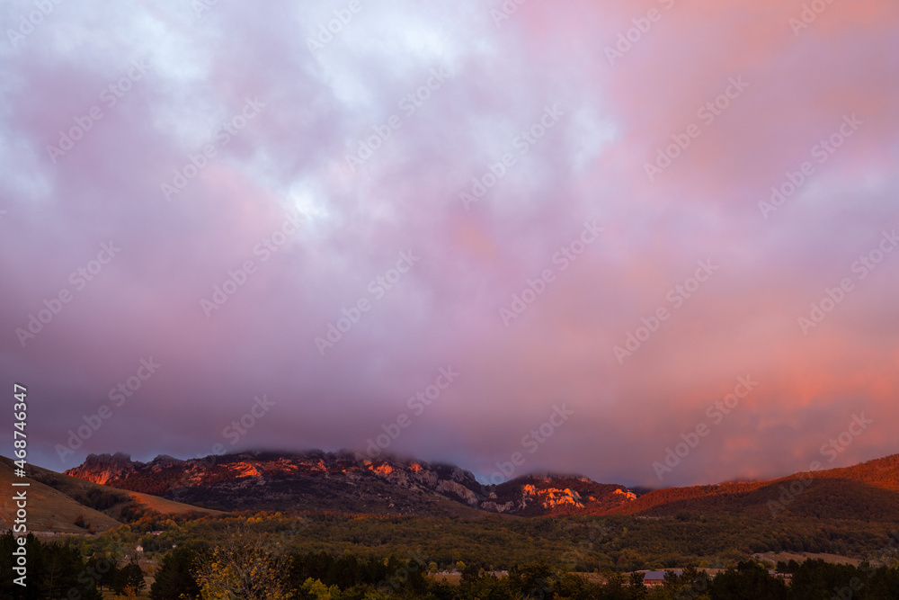 Clouds lit by the sunset on the Velebit mountain, Croatia