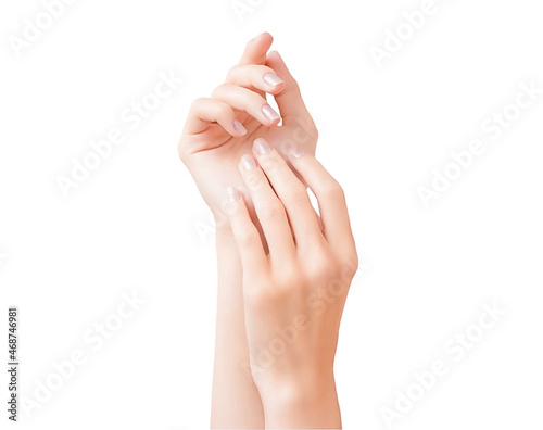 Female hands with a neat nude manicure isolated on a white background.