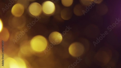 This is stock motion graphic that shows shimering orange festive bokeh lights. photo