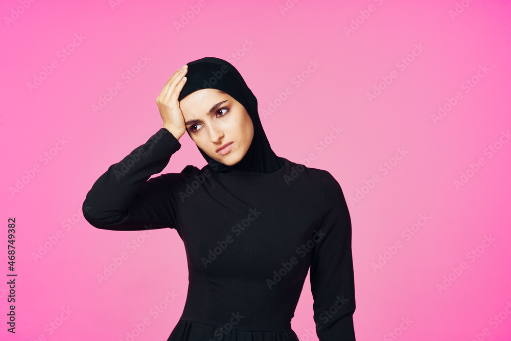 muslim woman in black hijab posing hand gesture model muslim woman in black hijab posing hand gesture model