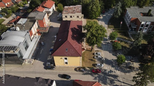 Arilje Municipality and Town, Serbia. Aerial View of Townhouse Building on Sunny Summer Day, Drone Shot photo