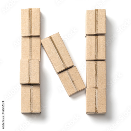 Letter N. Alphabet from cardboard boxes for delivery isolated on white background