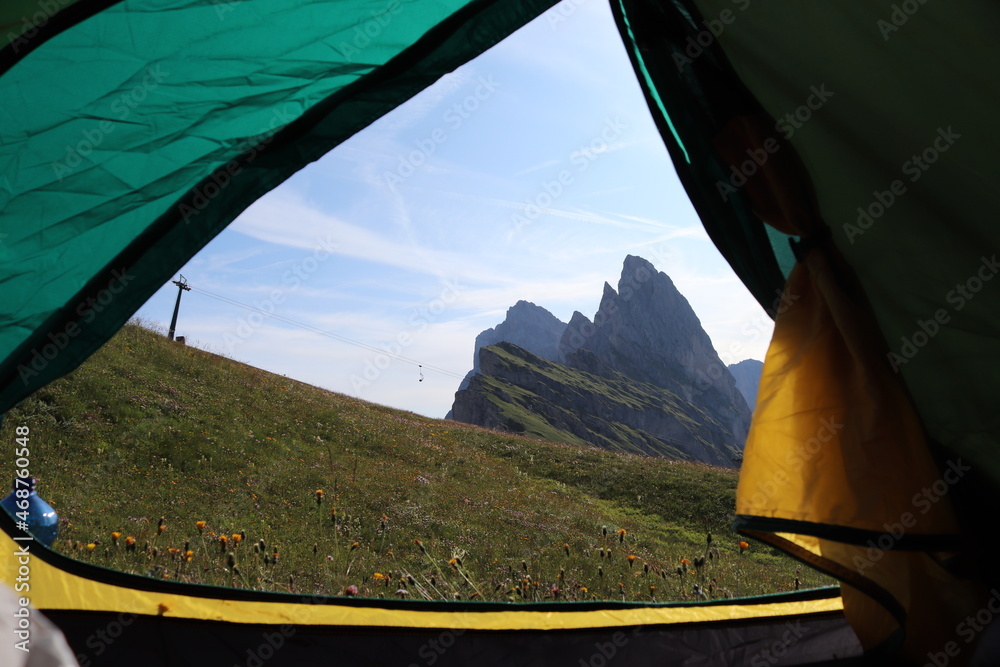 Inside a tent with a view of the Dolomites - mountains