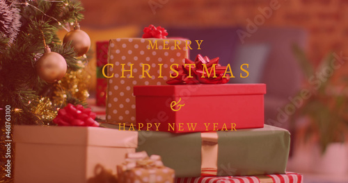 Image of merry christmas and happy new year text over presents