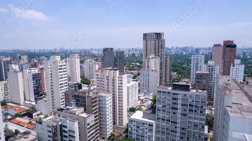 Aerial view of Jardins district in S  o Paulo  Brazil. Big residential and commercial buildings in a prime area near Av. Paulista with Ibirapuera Park on background. 