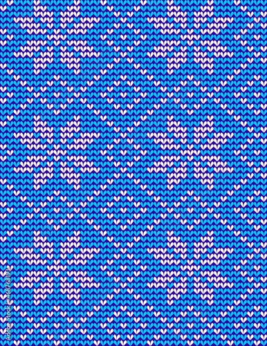 Blue knitted scandinavian snowflakes seamless pattern background. You see 6 tiles here.
