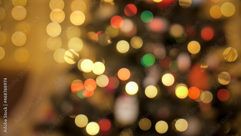 Abstract out of focus shot of colorful Christmas light bokeh. Perfect backdrop for winter holiday celerations. Abstract out of focus shot of colorful Christmas light bokeh. Perfect backdrop for winter holiday celerations.