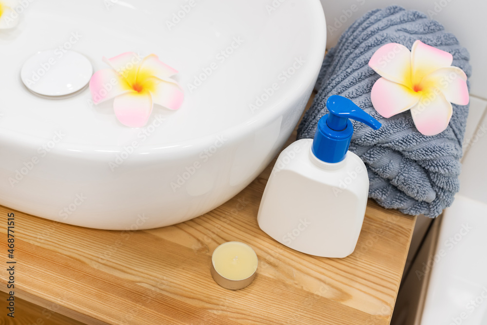 White Sink Gray Towell Candle Plumeria Flower SPA at Home Concept Horizontal White Sink Gray Towell Candle Plumeria Flower SPA at Home Concept Horizontal