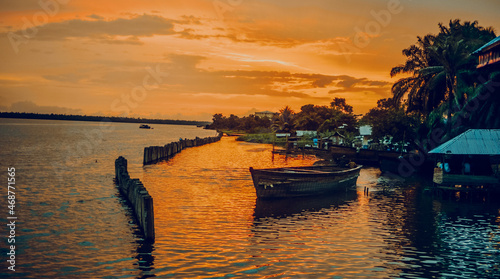 Nigeria, Delta State, Koko river and fishing village at sunset