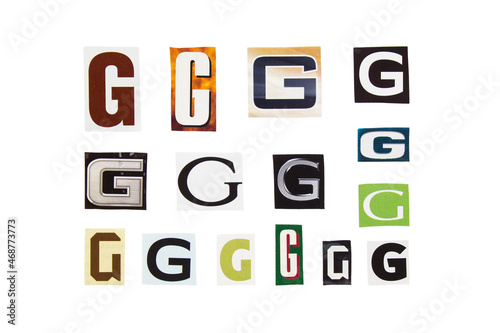 Alphabet letter G cutting from magazine paper. Newspaper clippings with letter G isolated on white background. Anonymous text concept.
