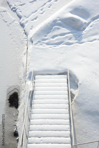 Stairs covered with fresh snow
