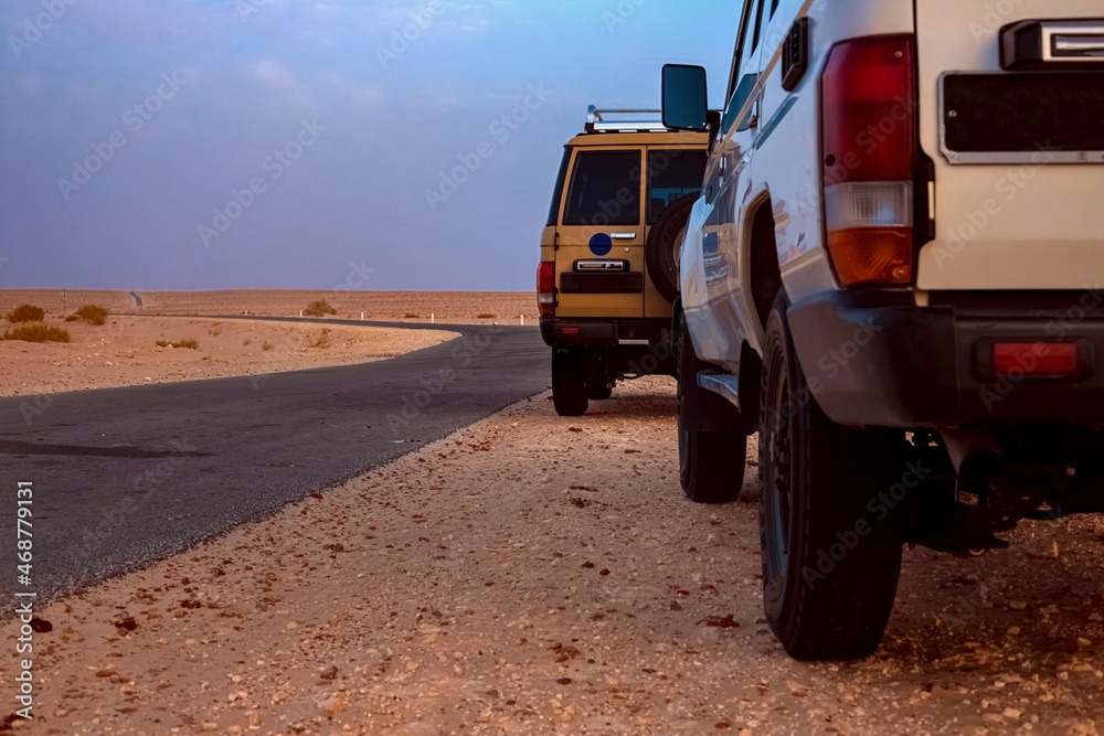 Desert Safari. SUVs in the middle of the Sahara Desert, Tunisia.