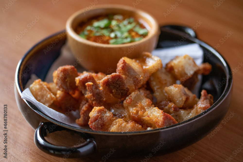 Deep-fried pork belly with fish sauce and spicy dipping sauce Deep-fried pork belly with fish sauce and spicy dipping sauce