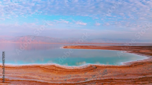 Incredible aerial view on the dead sea with beautiful mountains near sunset