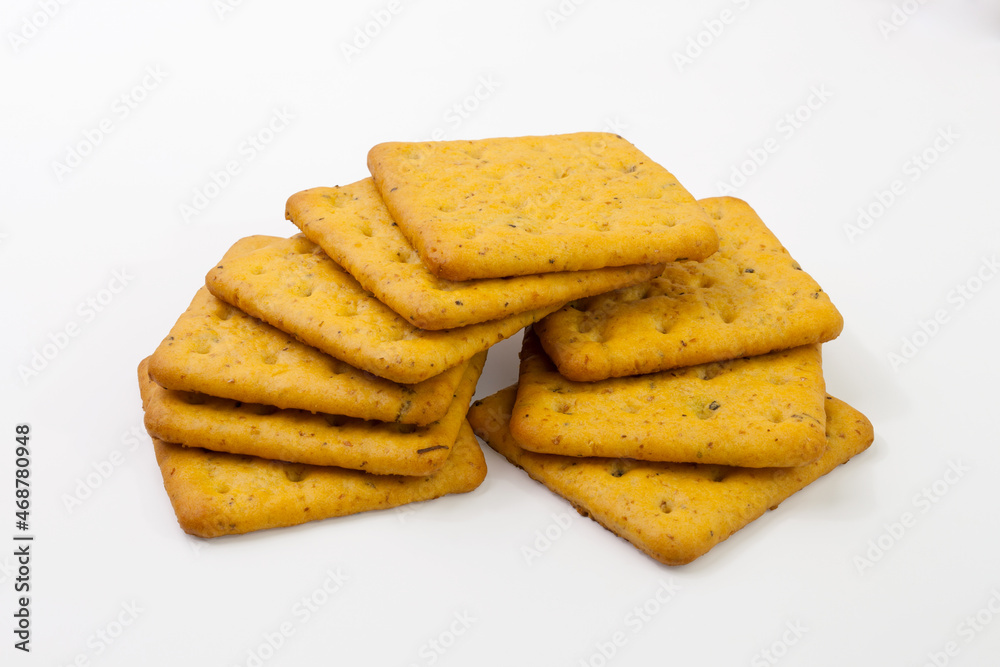Crackers with bran and spicy herbs. Isolated on white background. Crackers with bran and spicy herbs. Isolated on white background.