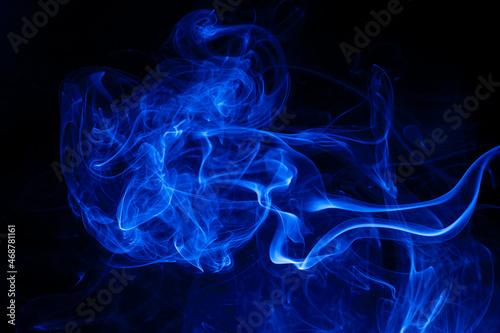 Movement blue smoke on black background.
