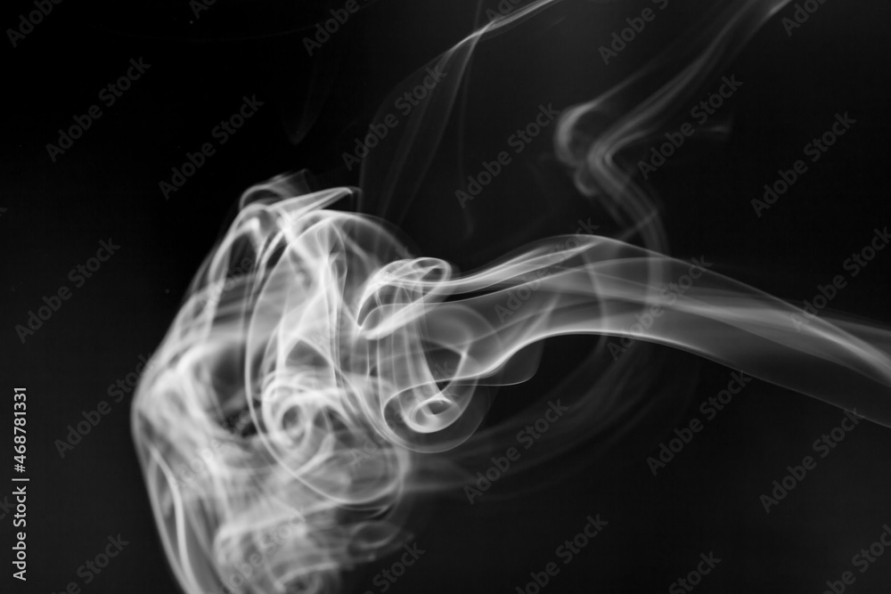 White smoke motion on black background. White smoke motion on black background.