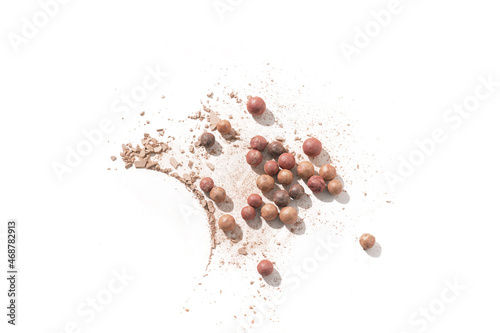 Face powder and powder balls isolated on white background.