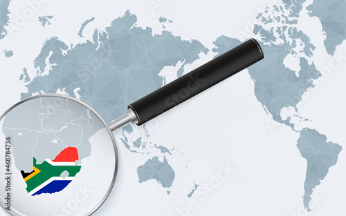 Asia centered world map with magnified glass on South Africa. Focus on map of South Africa on Pacific-centric World Map.