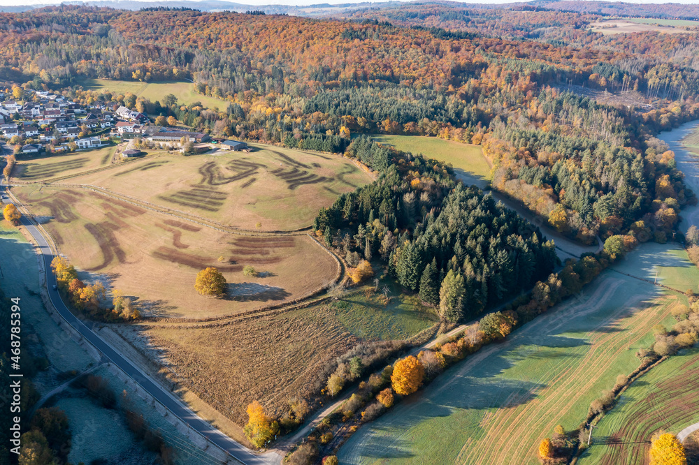 Bird's eye view of fields and forests in the Aar Valley / Germany in the Taunus in autumn 