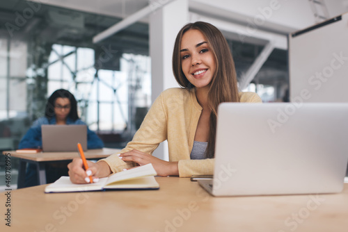 Business women working in open space office