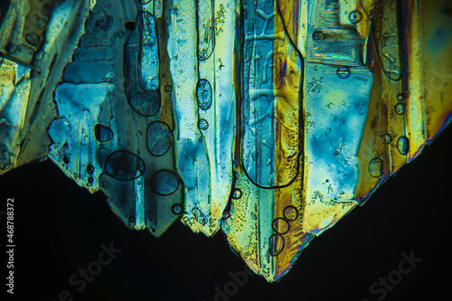 Colorful crystals under microscope, polarization colors, polar filters