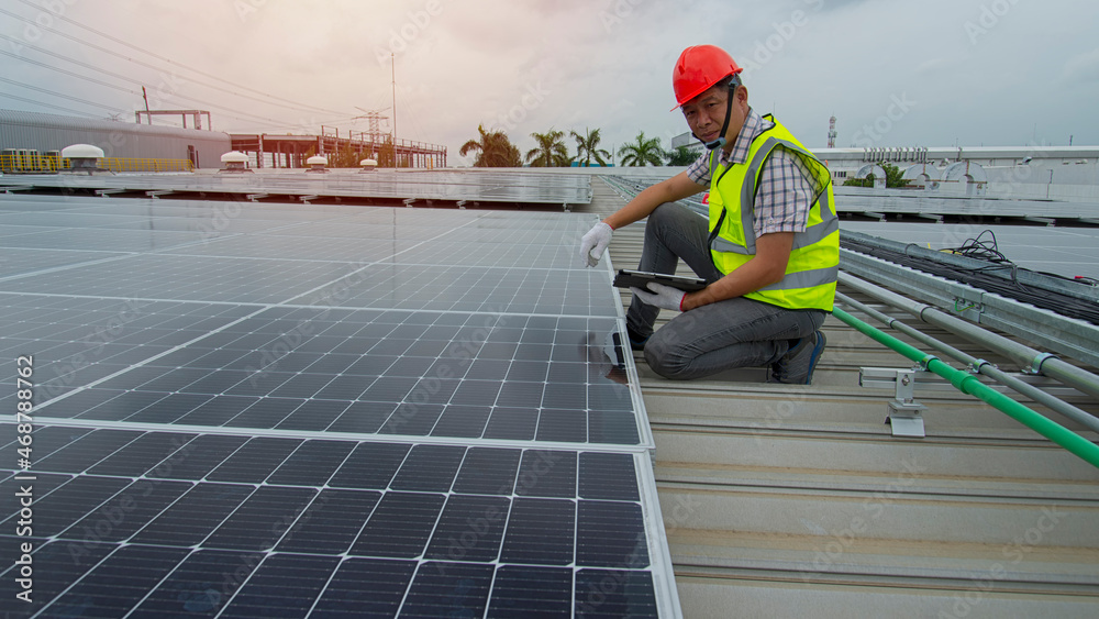workers at work on a site. engineer at work. worker inspection Solar panel on rooftop. workers at work on a site. engineer at work. worker inspection Solar panel on rooftop.