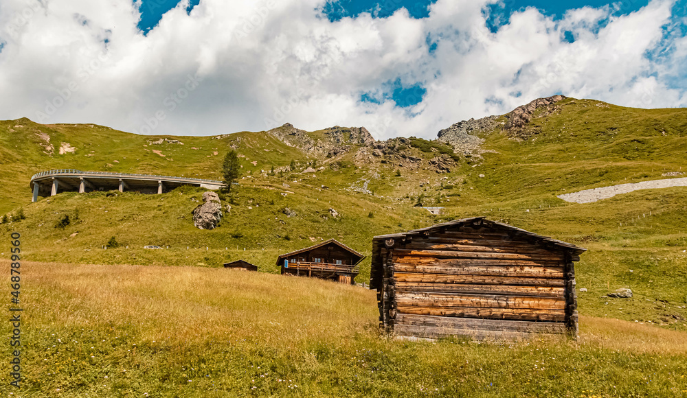 Beautiful alpine summer view with a wooden hut at the famous Grossglockner high Alpine road, Kaernten, Salzburg, Austria