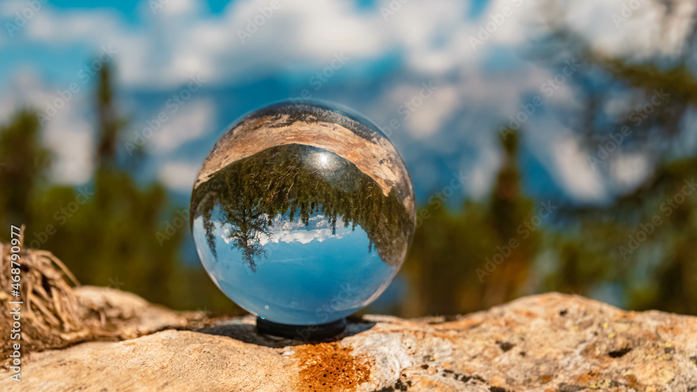 Crystal ball alpine landscape shot at the famous Reiteralm, Pichl, Schladming, Steiermark, Austria Crystal ball alpine landscape shot at the famous Reiteralm, Pichl, Schladming, Steiermark, Austria