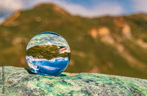 Crystal ball alpine landscape shot at the famous Grossglockner high Alpine road, Salzburg, Austria © Martin Erdniss