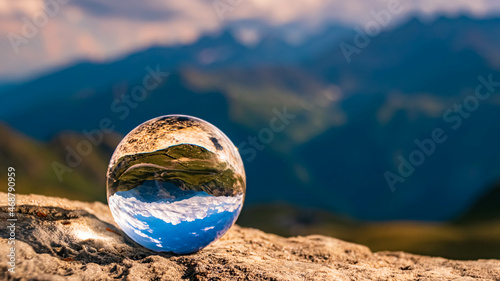Foto Crystal ball alpine landscape shot at the famous Grossglockner high Alpine road,